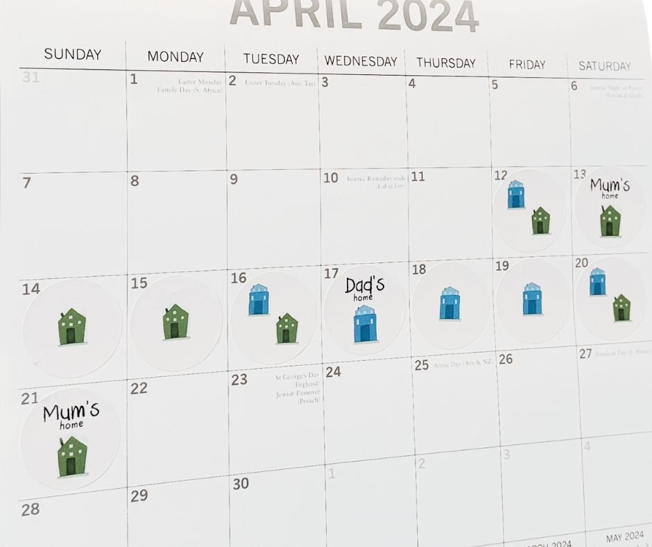 calendar month showing parenting schedule with blue house and green house stickers